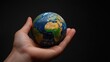 © ADD PHOTO - Human Hand Holding Vibrant Earth Globe Depicting Global Sustainability and Environmental Awareness