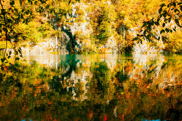 Wall Mural - Stunning Autumn Landscape with Vibrant Foliage Reflection on Water