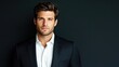 © Viktoriia Kan - The portrait showcases a handsome man dressed sharply in a black suit and white shirt, exuding confidence while looking directly at the camera under studio lighting