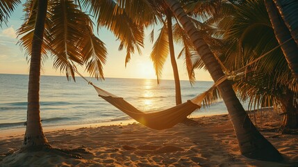 Wall Mural - Hammock Suspended Between Palm Trees on a Sandy Beach at Sunset