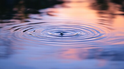 Wall Mural - A serene ripple in water at sunset, capturing tranquility and nature's beauty.