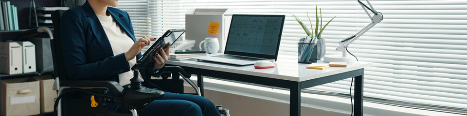 header with woman with disability using digital tablet