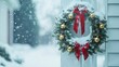 © Botboy - A beautiful holiday wreath made of pine branches, adorned with red ribbons and golden bells, hanging on a snow-covered porch.