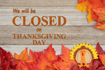 Wall Mural - We will be closed Thanksgiving Day with fall leaves and turkey on weathered wood