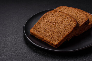 Fresh crispy brown bread sliced from whole grain flour