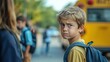 © Lamina - Boy frowning near school bus, conveying emotions of frustration or reluctance in a typical school morning scene.