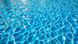 © PuriStudio - Crystal clear water in swimming pool reflects sunlight, creating mesmerizing patterns and ripples. vibrant blue hue invites relaxation and enjoyment