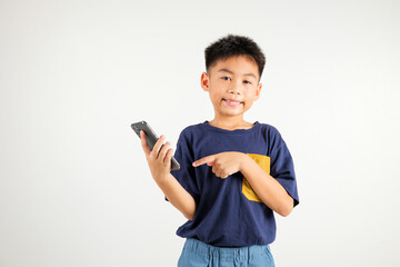 Portrait Asian happy young kid boy smile making finger pointing on screen smartphone in hand, Primary children attractive shopping online application isolated studio shot white background