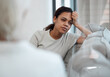 © KayExam/peopleimages.com - Woman, therapist and sad patient thinking of mental health crisis, abuse and anxiety in consultation. Psychology session, counseling and girl with stress, depression and remember trauma in office