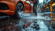 © Vertigo Images - Closeup of a man washing his car on a rainy day.
