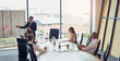 © peopleimages.com - Boardroom, teamwork and people in meeting, white board and controller with financial report and presentation. Business, speaker and group in office, listening and discussion of sales and analysis