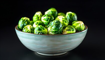 Wall Mural - Vibrant Green Brussels Sprouts Contrast Against Bold Black Background