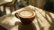 © GoldPumaze - An artistic representation of a cup of coffee with creative latte art, placed on a wooden table.