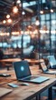 © AURA COLLECTIONS - A modern workspace with laptops and a network visualization.