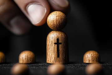 Chosen One: A single wooden figure, marked with a cross, is selected from a group of identical figures, symbolizing leadership, faith, or a chosen path.  