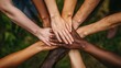 © nurman - Diverse hands clasped together in unity, representing teamwork, collaboration, and inclusion.