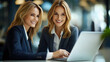 © Siasart Stock - Two Businesswomen Working on Laptop - Realistic Photo