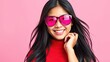 © Tilak - Happy young woman, wearing sunglasses Fashionable Woman, portrait of a woman wearing glasses
