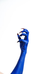 A witch's blue hand with sharp red nails on a white background. It exudes a demonic, monstrous vibe, blending vampire, alien, and ghostly features, creating a perfect Halloween horror image.