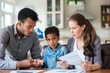 © miss irine - Couple and young daughter sitting at kitchen table discussing family finances. Woman and man reviewing bills, budget, and expenses. Happy family making financial plan, saving, and investing together.