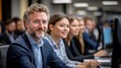 © AICraft - Confident businessman working in an office with colleagues