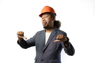 the project leader makes a gesture of dissatisfaction or disbelief by giving a thumbs dostylish asian man with orange suit and helmet on white background. construction or mining business concept photo