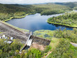 © Austockphoto - The Enoggera Reservoir, with flowing spillway, in the Brisbane suburb of The Gap