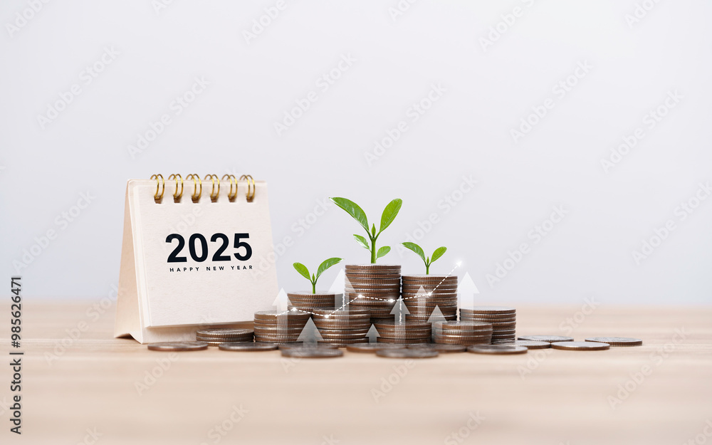 stock-foto-calendar-happy-new-year-2025-with-graph-and-stack-of-growth-coins-financial-annual-plan-for-save-money-budget-tax-investment-financial-savings-and-new-year-resolution-retirement-concept-adobe