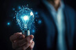 © oksa_studio - Businessman holding light bulb connected with network concept for idea innovation and inspiration