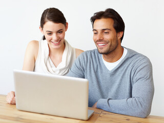 Wall Mural - Business people, reading or laptop with good news for communication, email or social media at office. Businessman, woman or colleagues with smile on computer for internet or connectivity at workplace