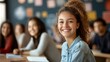 © Rstm - A happy young woman smiles at the camera, in a classroom setting.