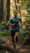 © spyrakot - Morning Forest Run: Man Jogging on Trail Promoting Health, Fitness, and Natural Wellbeing