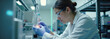 © 2April - Female Researcher Analyzing Sample in High-Tech Biotech Lab for Advanced Medical Innovation