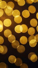 abstract background of bright yellow glowing bokeh.