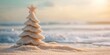 © Anastasija - A creative concept of a Christmas tree made of sand on the beach, merging holiday spirit with summer vibes.