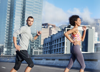 Canvas Print - Running, street and training with couple in city for start of fitness, athlete and wellness. Race, exercise and marathon workout with people for urban, health and sports performance together