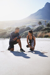 Sticker - Couple, tying laces and fitness at beach with discussion for morning, wellness and planning of workout. Happy, man and woman with shoes on sand for training, exercise and preparing for run together