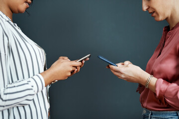 Wall Mural - business women, hands or typing with phone for communication, data sync or share in studio. closeup,