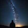 © Hi Dream - A starry night sky with a silhouette of a person gazin