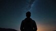 © Hi Dream - A starry night sky with a silhouette of a person gazin