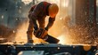 © B 7 YOU - Construction worker cuts concrete with a saw, sparks fly.