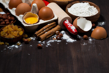 packaging of fresh eggs and ingredients for baking on wooden table