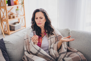 Poster - Photo of doubtful unsure woman dressed checkered shirt tacking pills indoors house apartment room