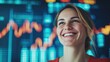 © nattapon98 - A cheerful woman smiling in front of a vibrant financial graph, representing success and positive emotions in business and finance.