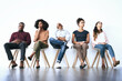 © JordaanExams/peopleimages.com - Tired, business people and job seeker in waiting room for interview, work opportunity and hiring. Row, candidates and bored with patience for creative agency, recruitment and employment process