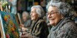 © phurinee - A group of elderly people attending a community art class, painting and creating together, celebrating the joy of learning new skills in retirement