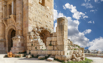 Arch of Hadrian in Gerasa (Jerash)-- was built to honor the visit of emperor Hadrian to Jerash in 129/130 AD, Jordan. Against the background of a beautiful sky with clouds