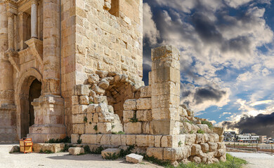 Arch of Hadrian in Gerasa (Jerash)-- was built to honor the visit of emperor Hadrian to Jerash in 129/130 AD, Jordan. Against the background of a beautiful sky with clouds