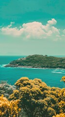 Wall Mural - Green Island With Blue Ocean Under A Cloudy Sky