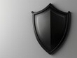 © auttawit - A black shield with a reflective surface